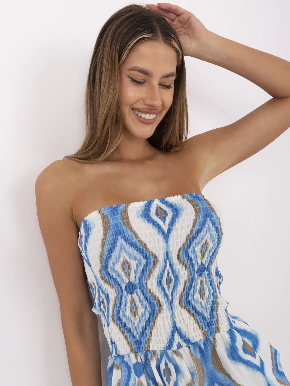 Salopette bianco-blu con motivo geometrico