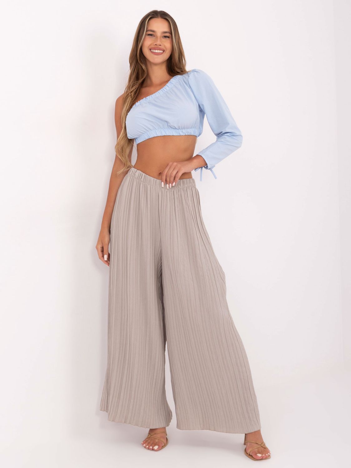 Pantaloni beige a gamba larga