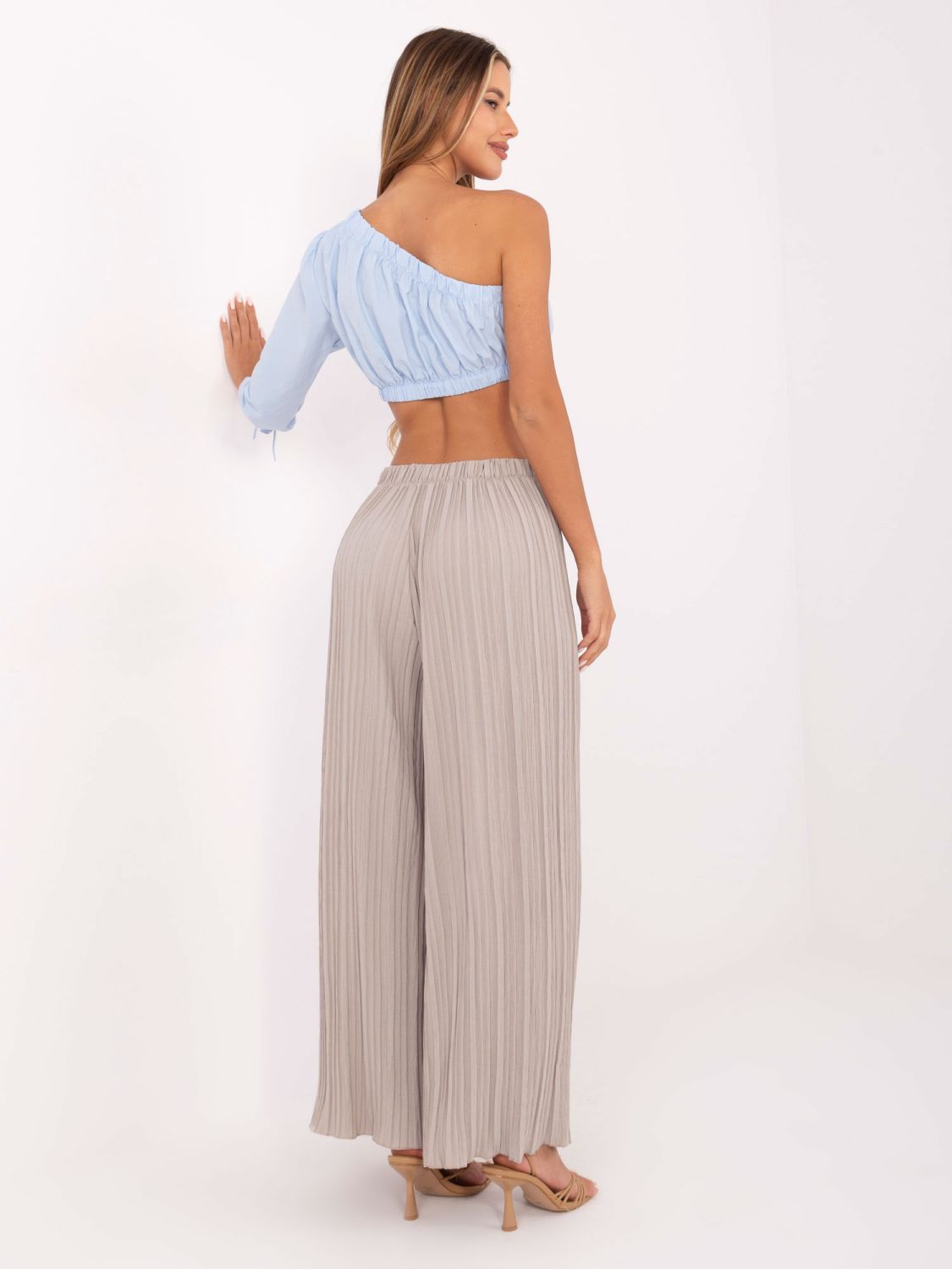 Pantaloni beige a gamba larga