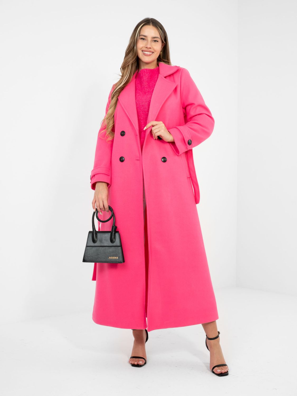 Elegante cappotto primaverile in rosa acceso