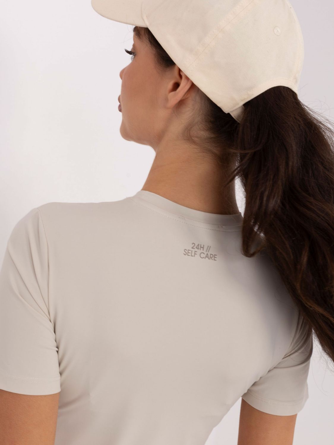 Blusa beige liscia a manica corta