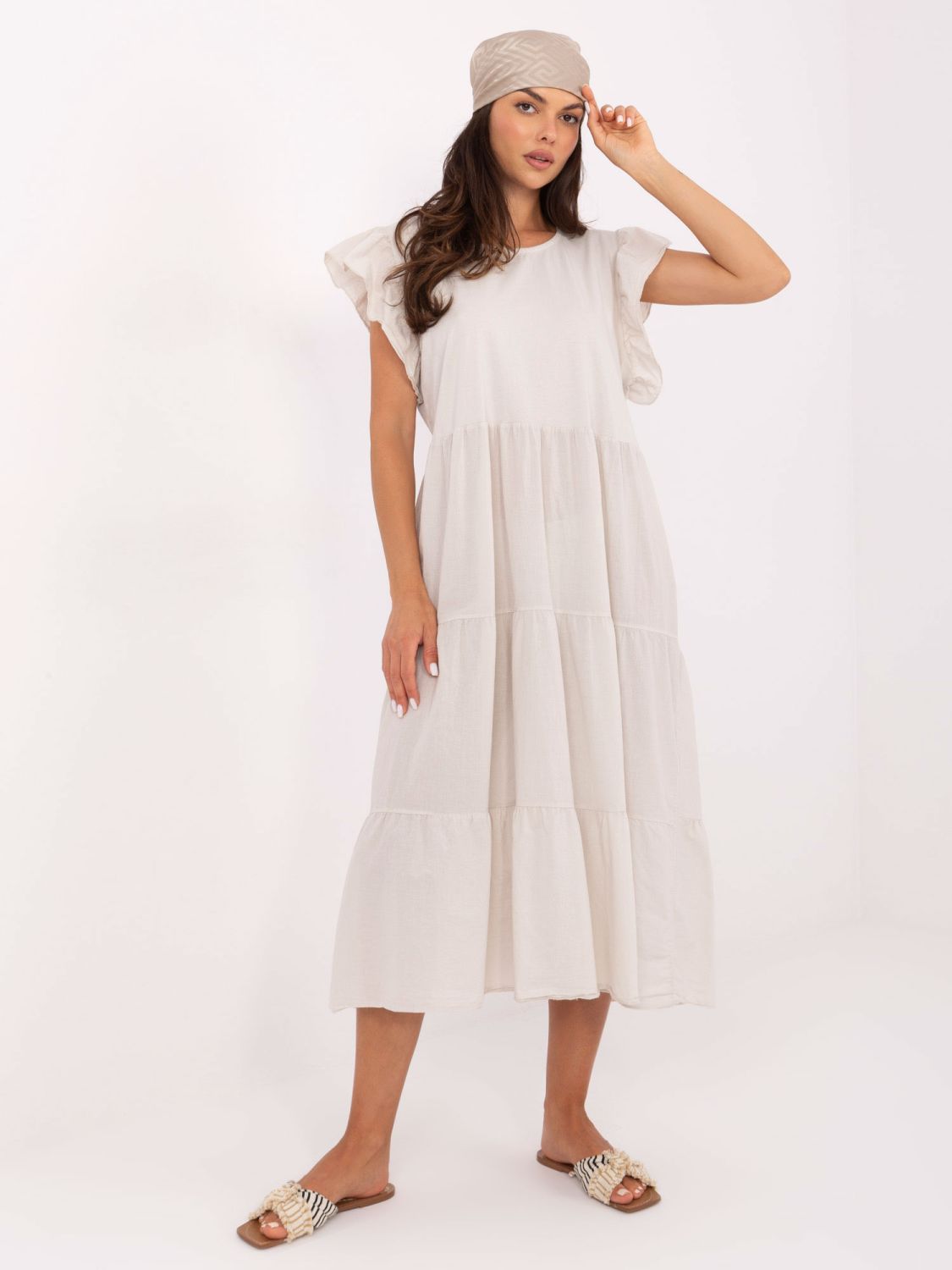 Abito oversize beige con volant