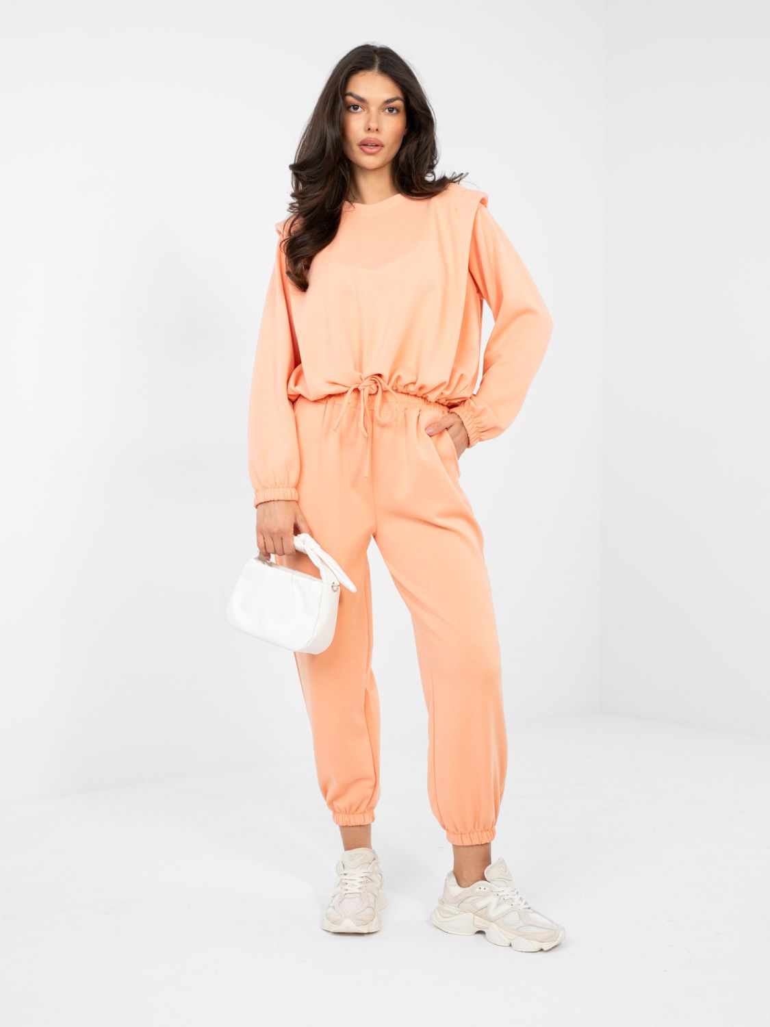 Completo arancione da donna con cintura e maniche lunghe