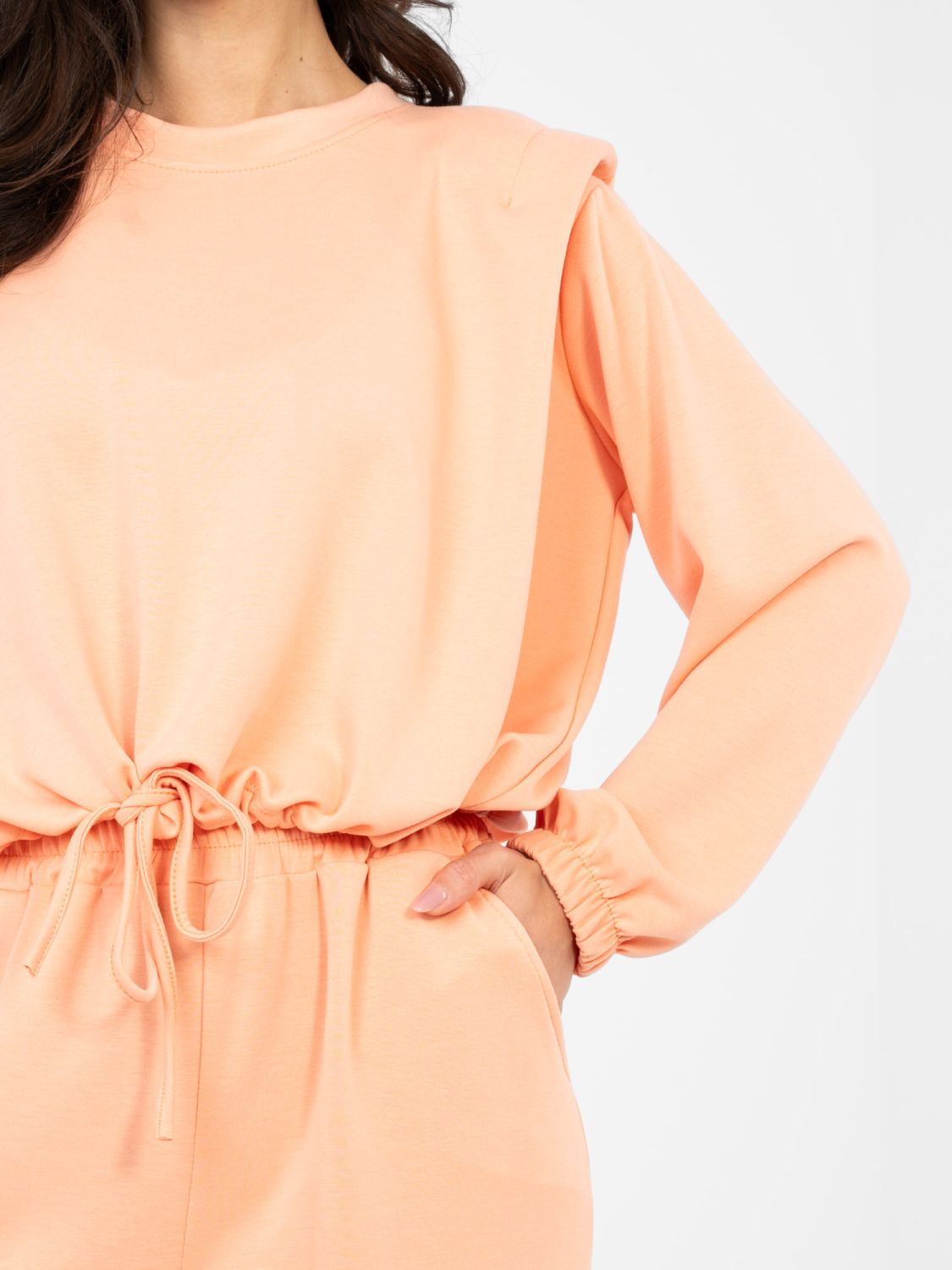 Completo arancione da donna con cintura e maniche lunghe