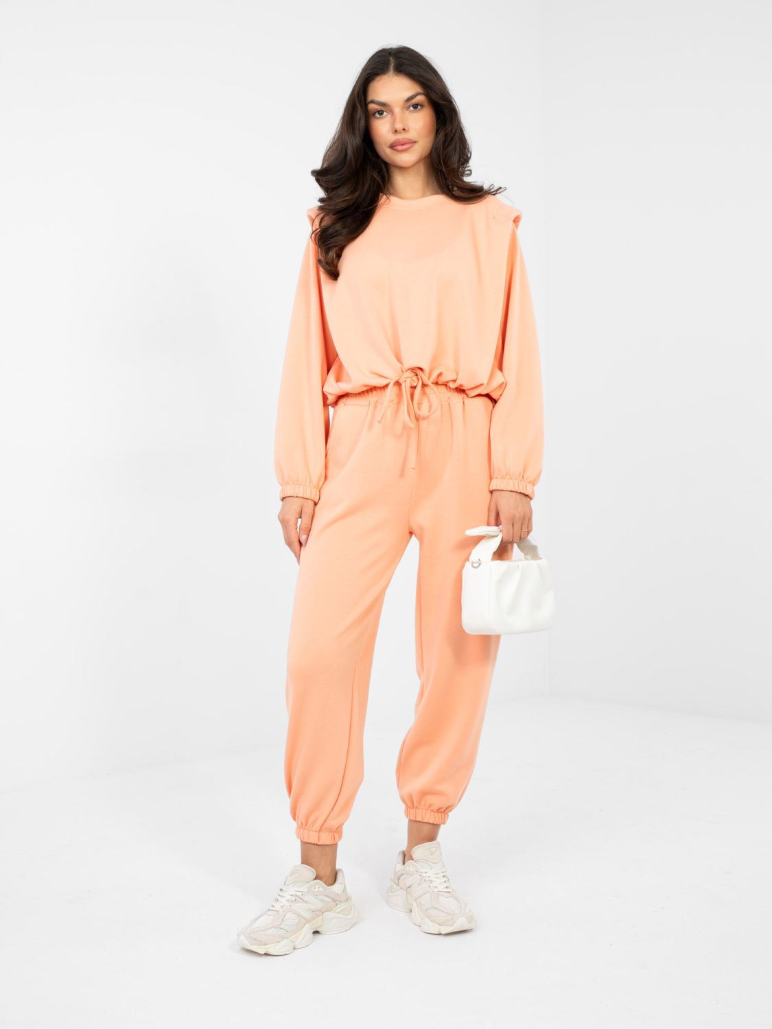 Completo arancione da donna con cintura e maniche lunghe