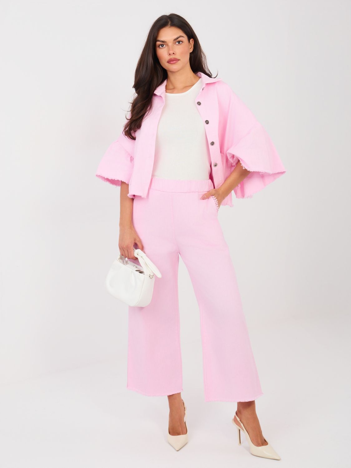 Kratka ružičasta traper jakna s volanom