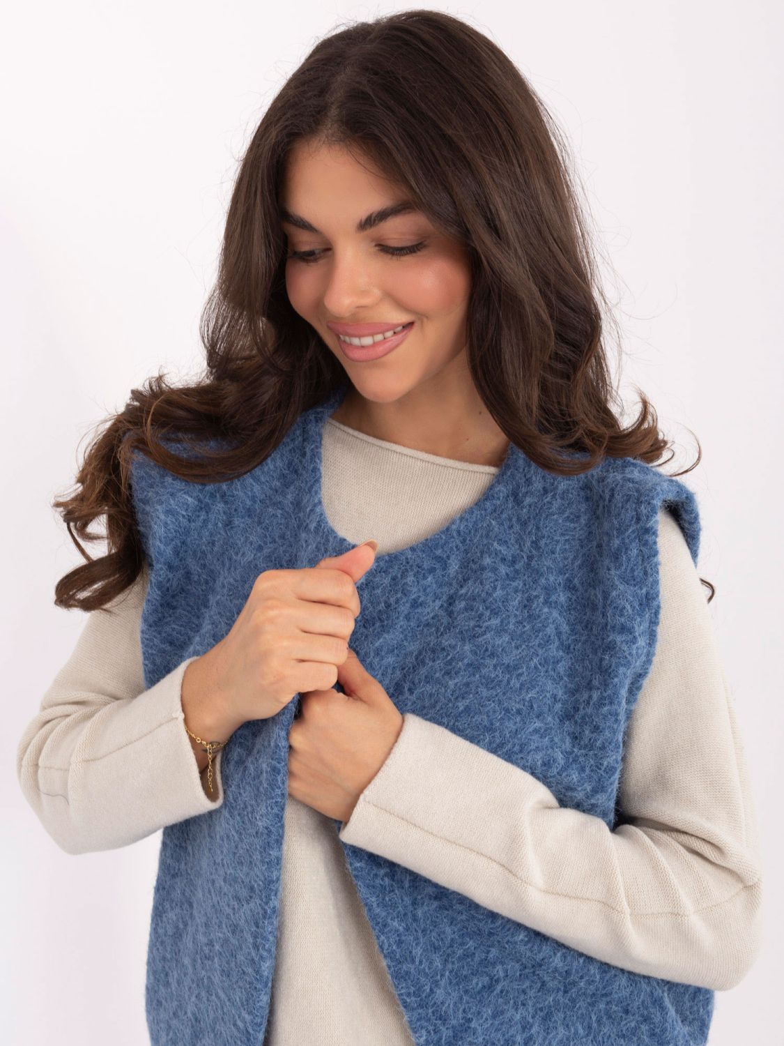 Gilet blu in maglia con tasche