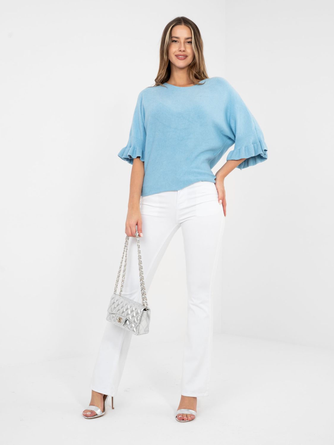 Elegante maglione blu con volant e maniche 3/4