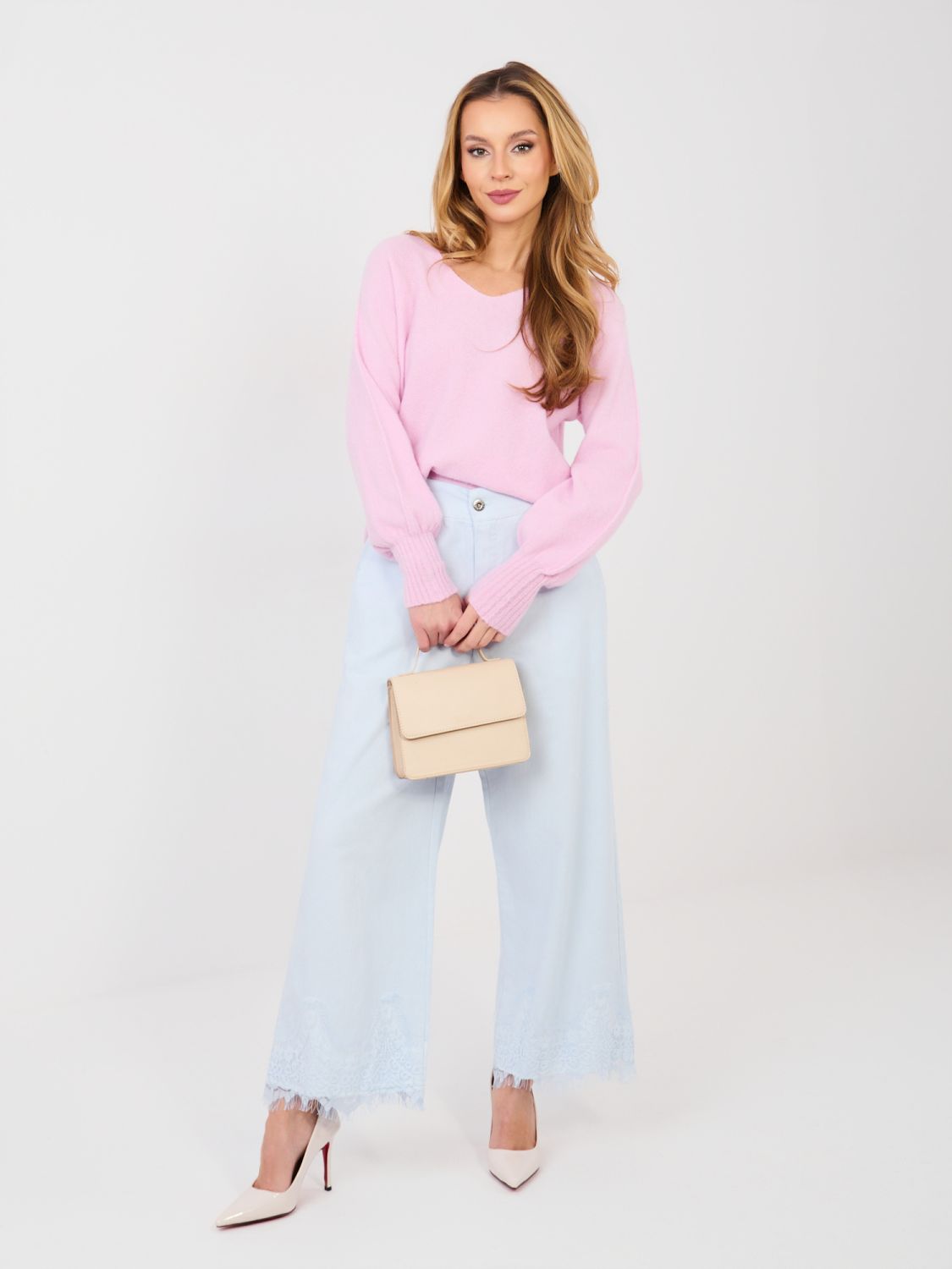 Maglione rosa con scollo a V