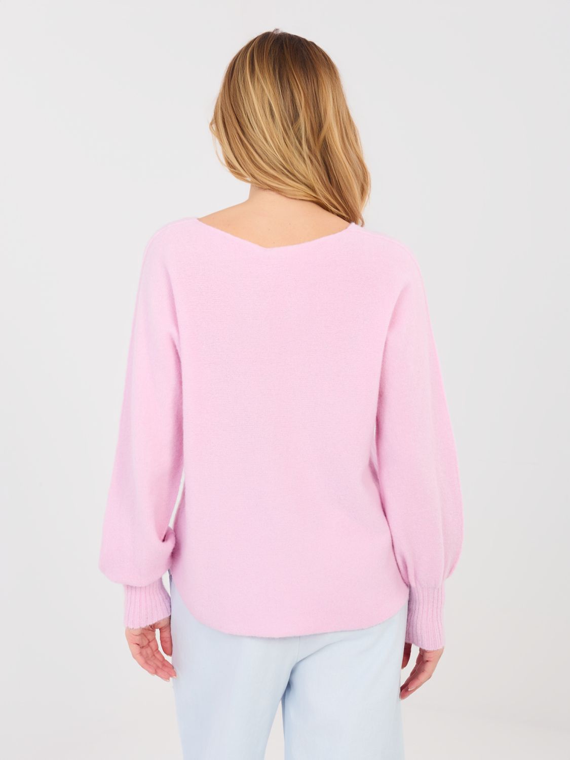 Maglione rosa con scollo a V