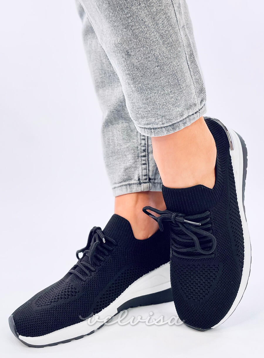 Sneakers da donna nere realizzate in tessuto elastico