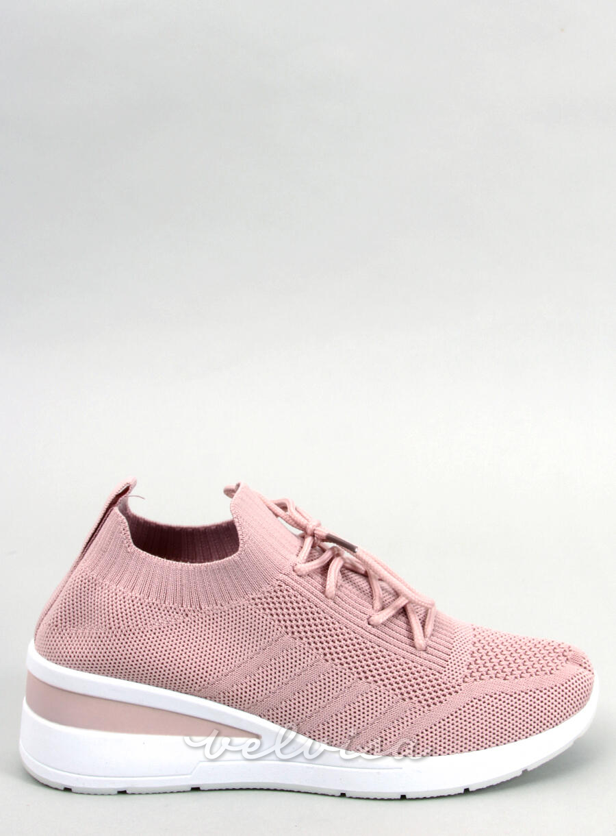 Sneakers con tacco nascosto rosa chiaro