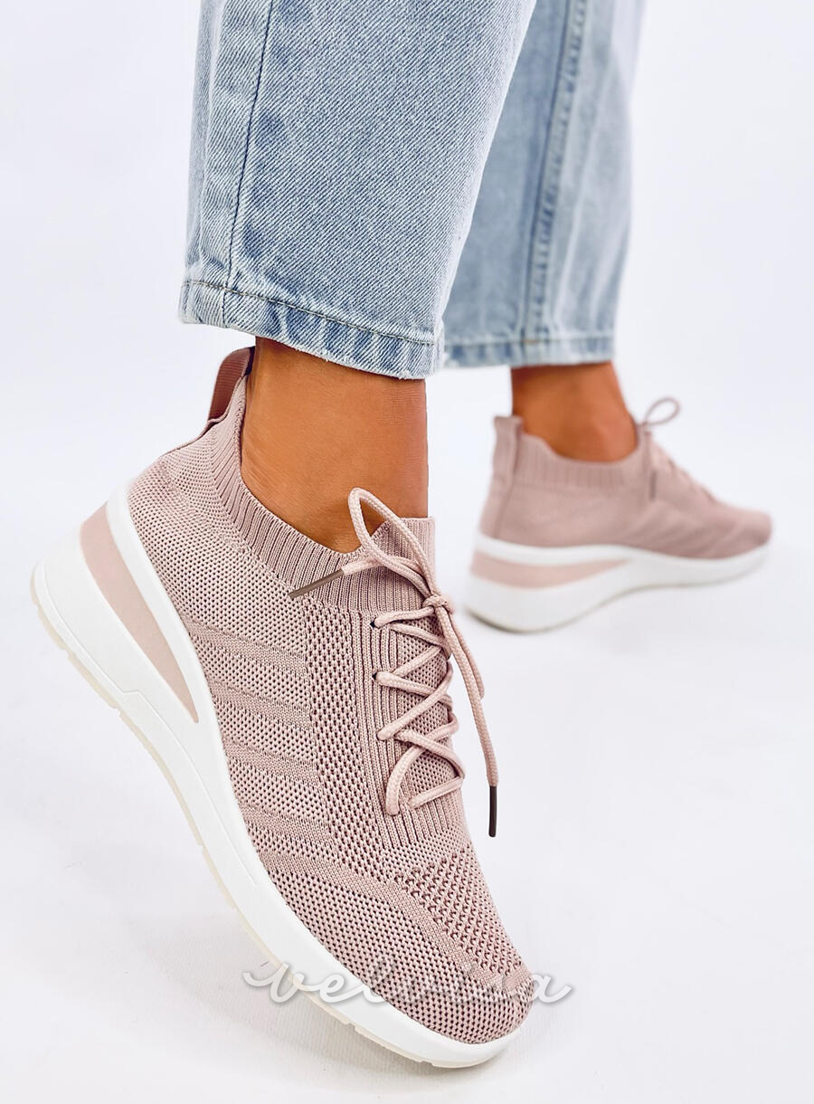 Sneakers con tacco nascosto rosa chiaro