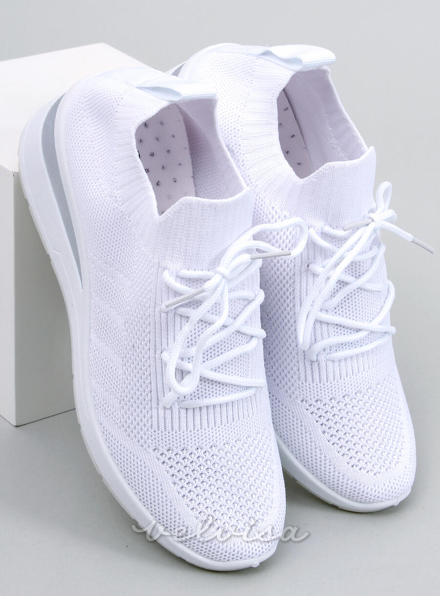 Sneakers con tacco nascosto bianche