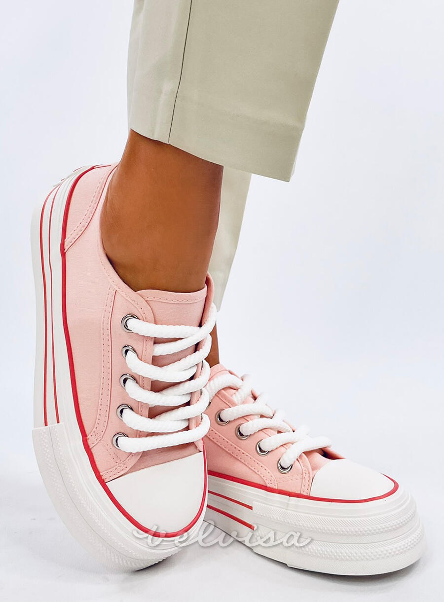 Sneakers in tela rosa chiaro su plateau alto