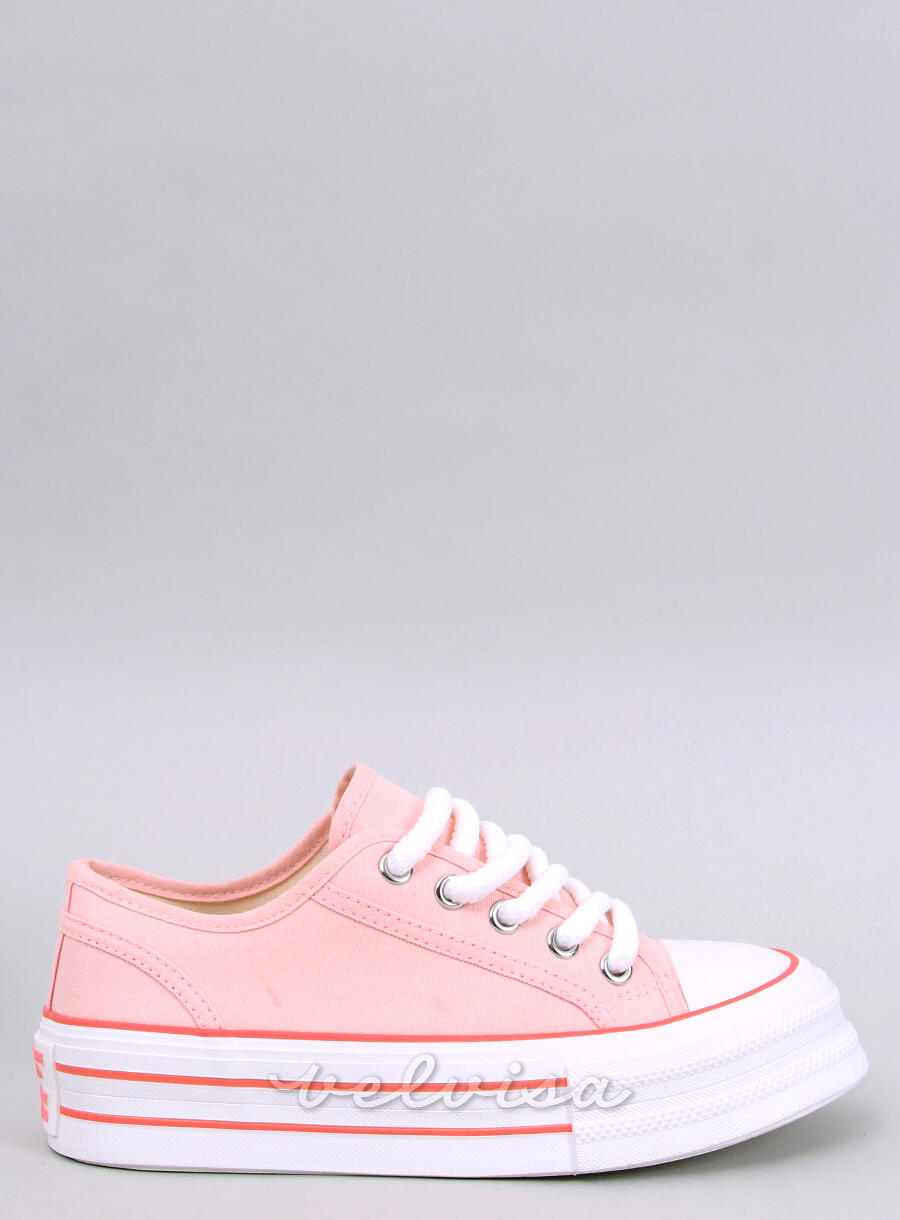 Sneakers in tela rosa chiaro su plateau alto