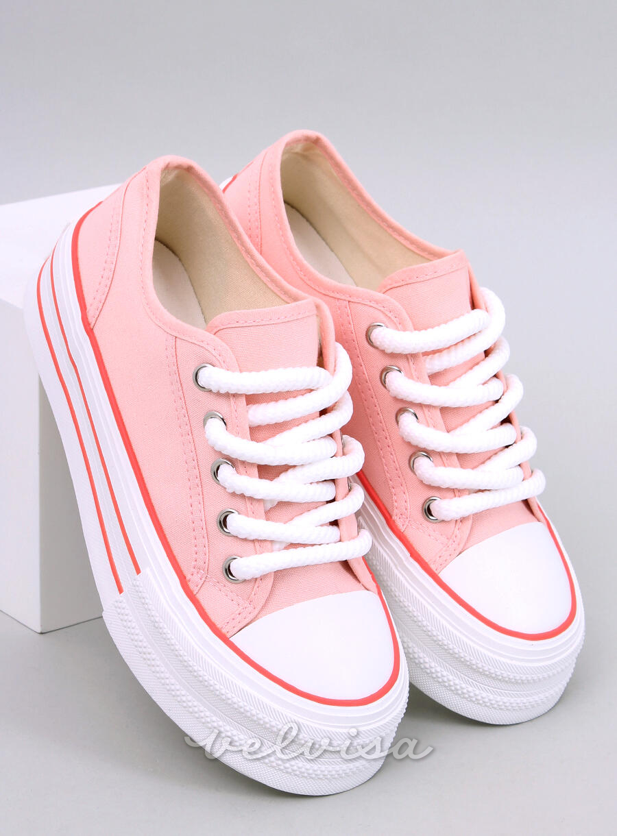 Sneakers in tela rosa chiaro su plateau alto