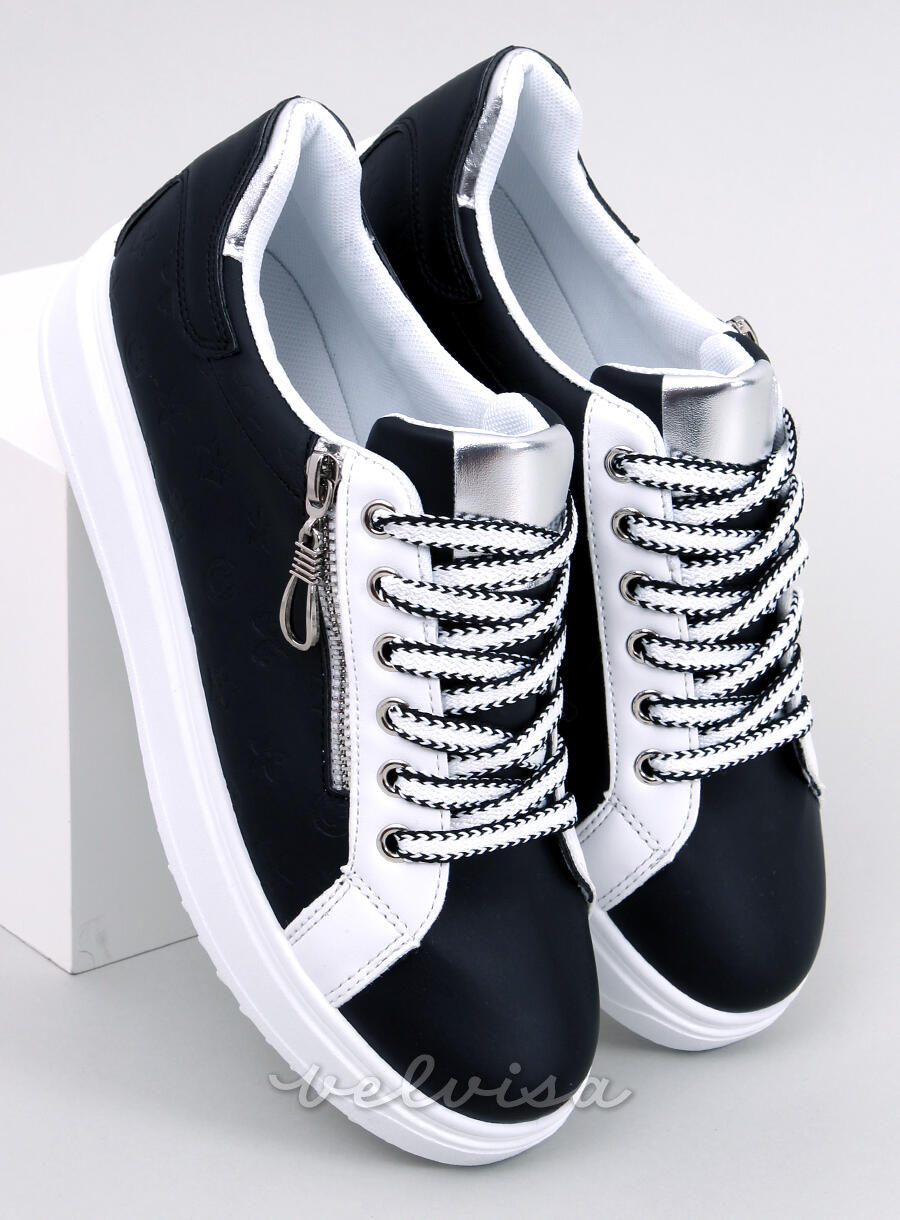 Sneakers nere realizzate in ecopelle