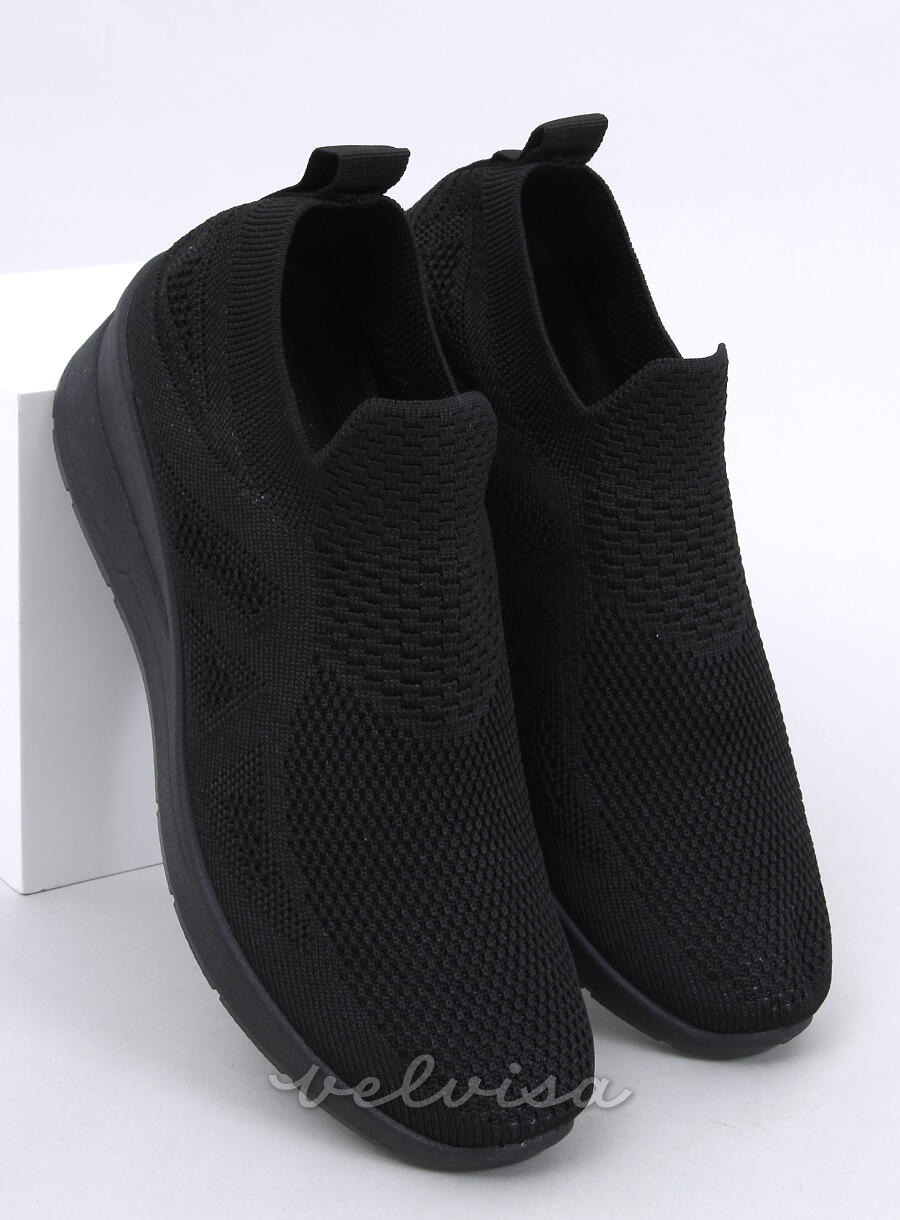Sneakers nere elasticizzate su suola rialzata