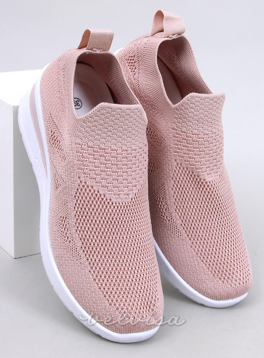 Sneakers rosa elasticizzate su suola rialzata