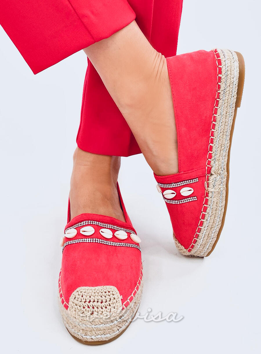 Espadrillas color corallo decorate con conchiglie