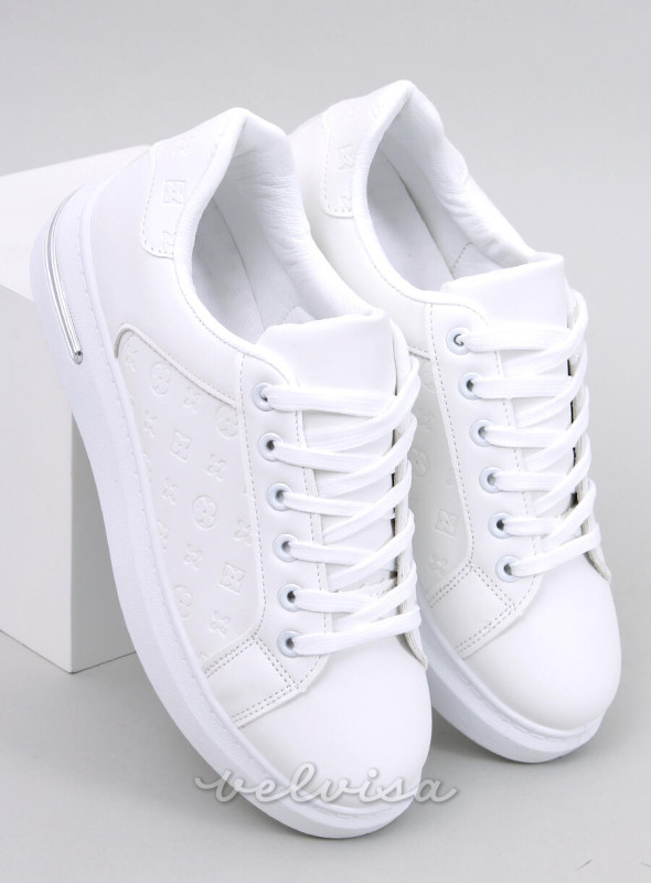 Sneakers bianche con motivo in rilievo