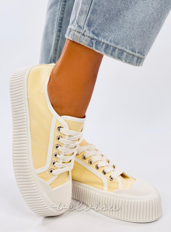 Sneakers da donna in tela sulla piattaforma giallo