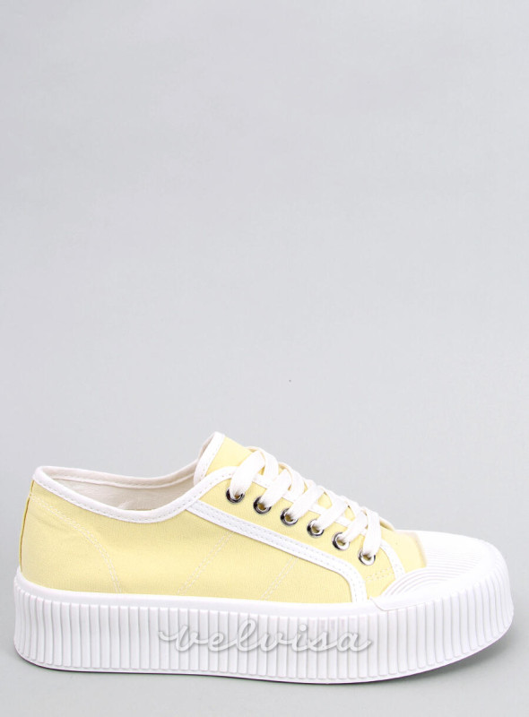 Sneakers da donna in tela sulla piattaforma giallo