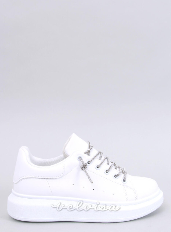 Sneakers bianche con lacci argento