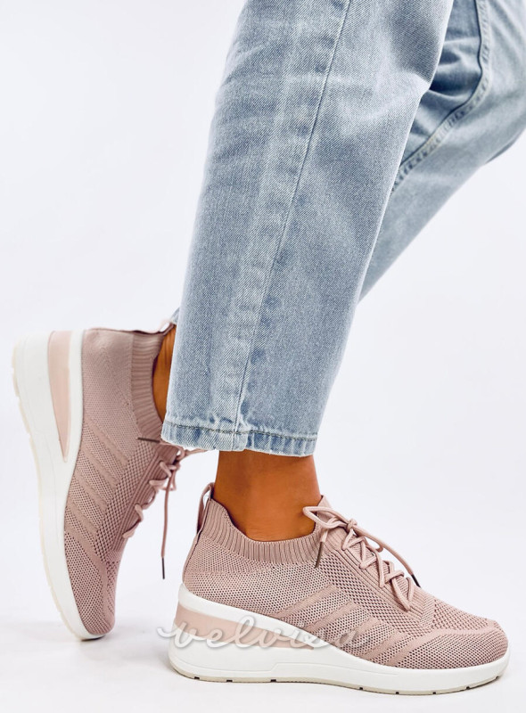 Sneakers con tacco nascosto rosa chiaro