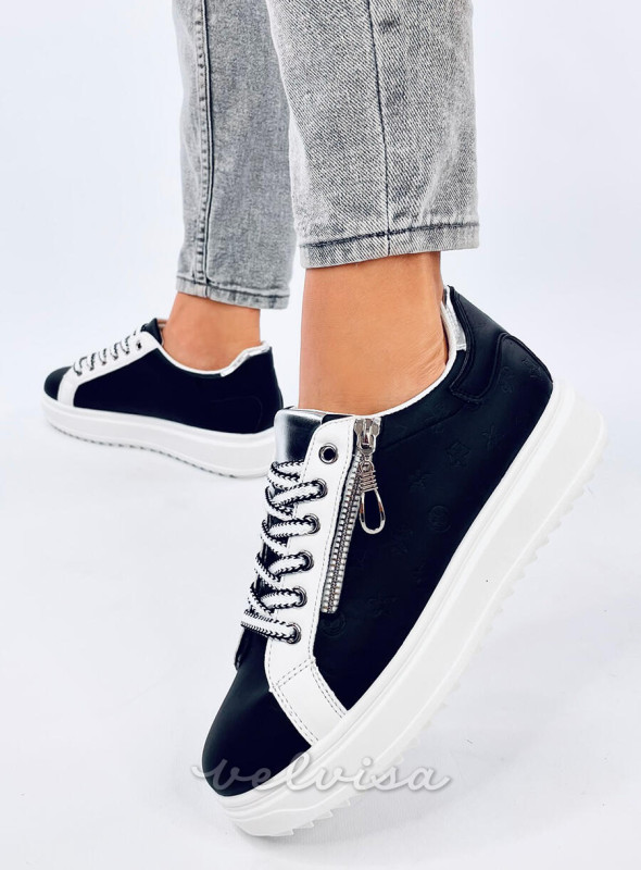 Sneakers nere realizzate in ecopelle