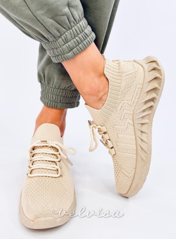 Sneakers realizzate in tessuto elastico beige