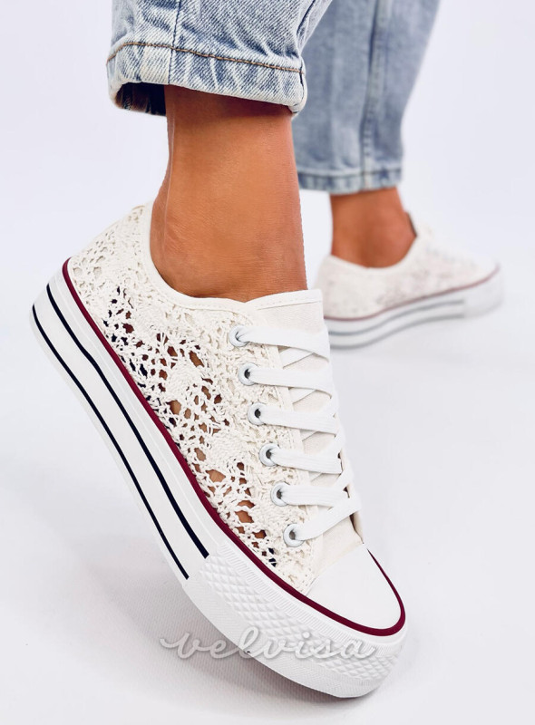 Sneakers in pizzo bianche