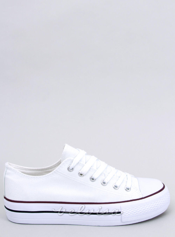 Sneakers basse in tela bianche