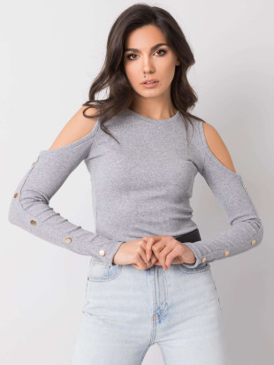 Blusa grigia con ritagli