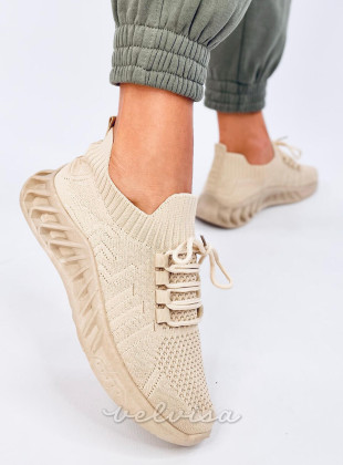 Sneakers realizzate in tessuto elastico beige