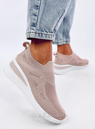 Sneakers rosa elasticizzate su suola rialzata