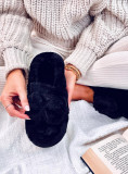 Pantofole in pelliccia con fiocco nere