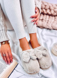 Pantofole in pelliccia con fiocco beige