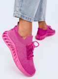 Sneakers realizzate in tessuto elastico rosa fucsia