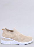 Sneakers beige elasticizzate su suola rialzata