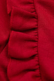 Abito rosso con gonna plissettata in ecopelle