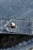 Giubbotto in denim blu con pelliccia nera