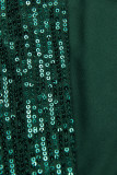 Abito verde smeraldo con paillettes