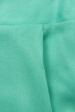 Tuta verde turchese