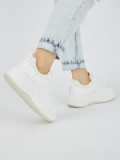 Sneakers bianche da donna con suola spessa