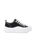 Sneakers neri e bianchi con suola spessa