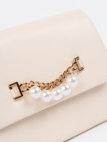 Elegante piccola borsa beige