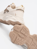 Sneakers con suola spessa in stampa leopardata