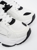Sneakers bianche con suola spessa